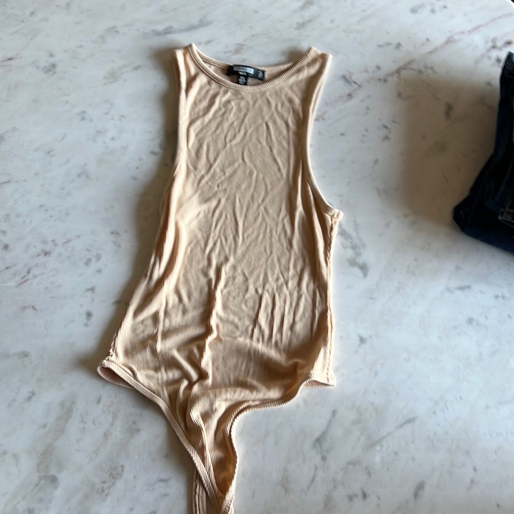 Tan thong bodysuit
